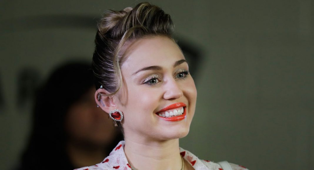 miley cyrus shuts down pregnancy rumors