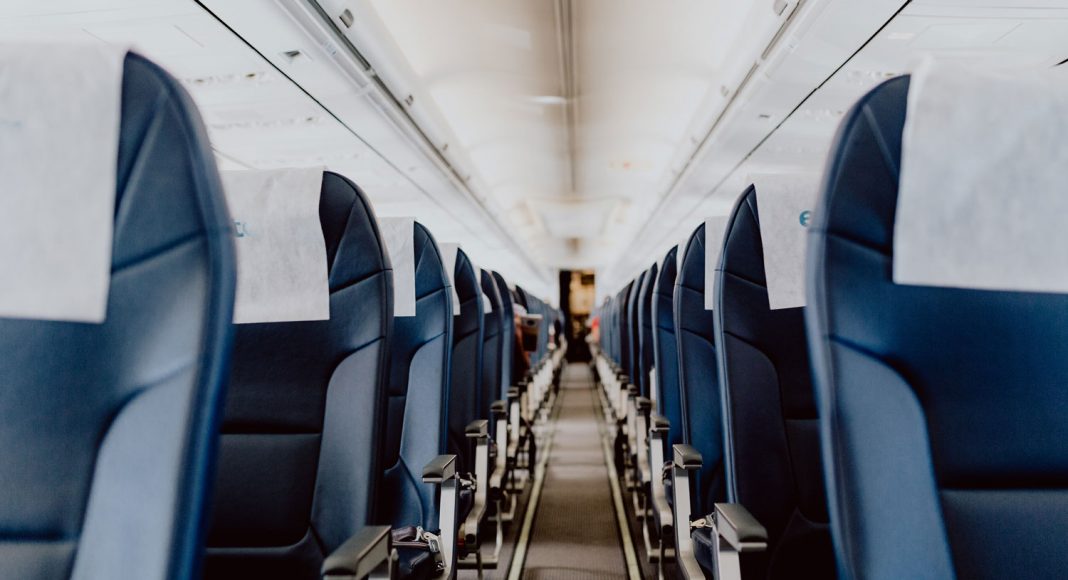 5 Tips To Help You Survive The Middle Seat On A Long Flight